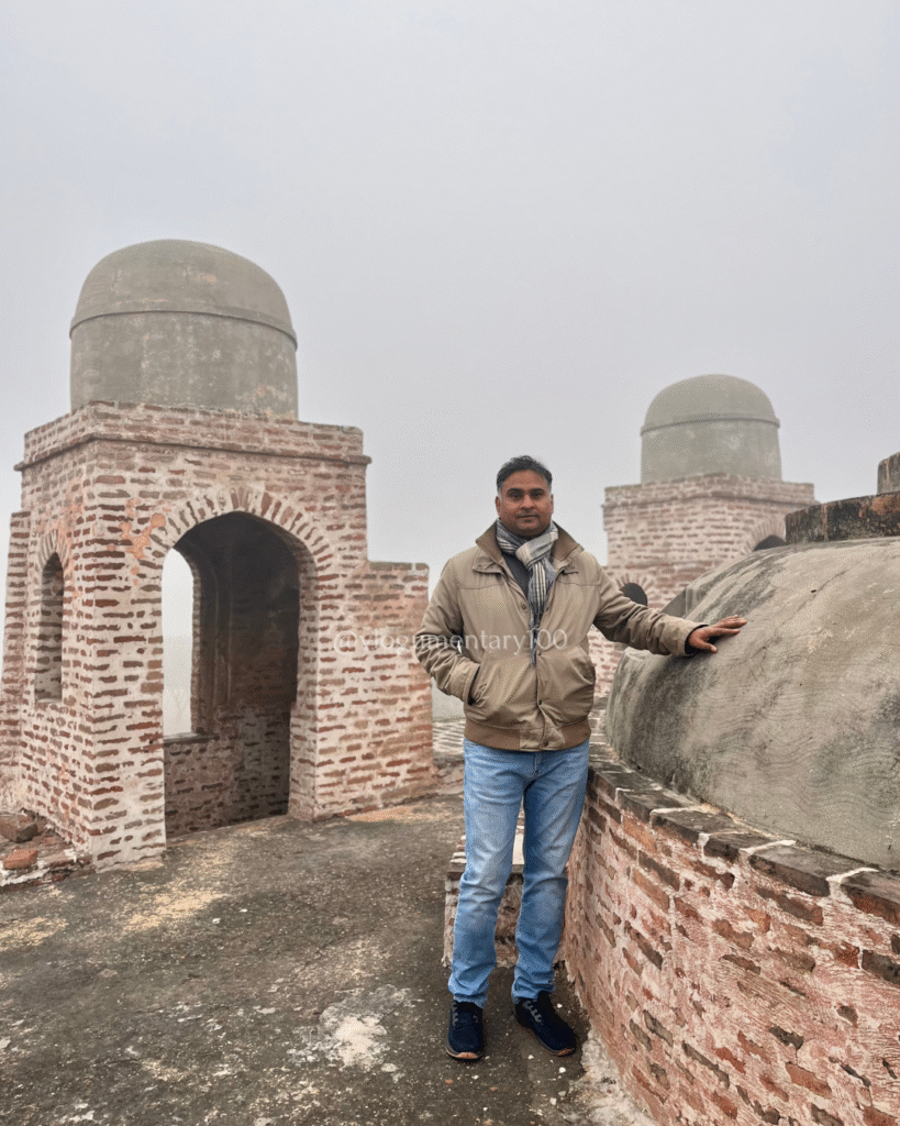 Dr. Muhammad Hameed Baoli's structure with the towers on top of which cement has been applied.