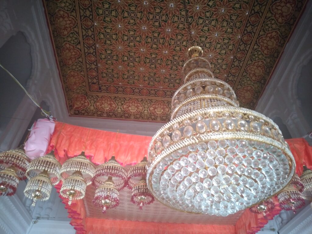 Interior of Gurdwara Janmashtham Guru Ram Das featuring Guru Granth Sahib