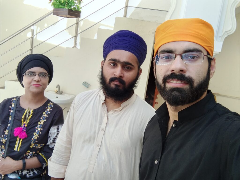 With a local sikh guide at Gurdwara Janam ashtham Guru Ram Das featuring Guru Granth Sahib