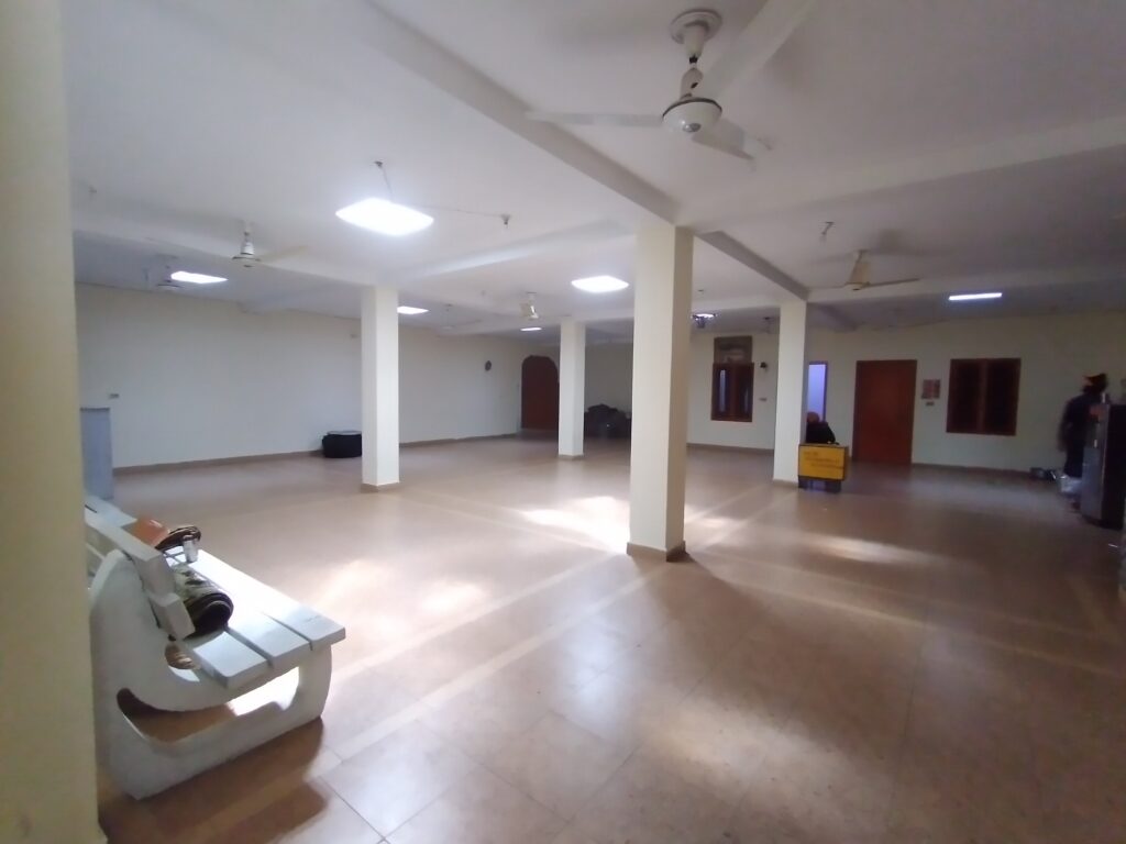 The Langer hall of Gurdwara Janam ashtham Guru Ram Das featuring Guru Granth Sahib